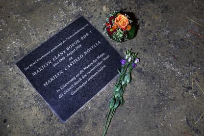 A grave with flowers.